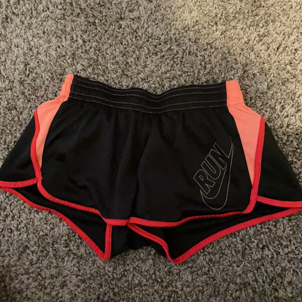 Black and pink Nike shorts